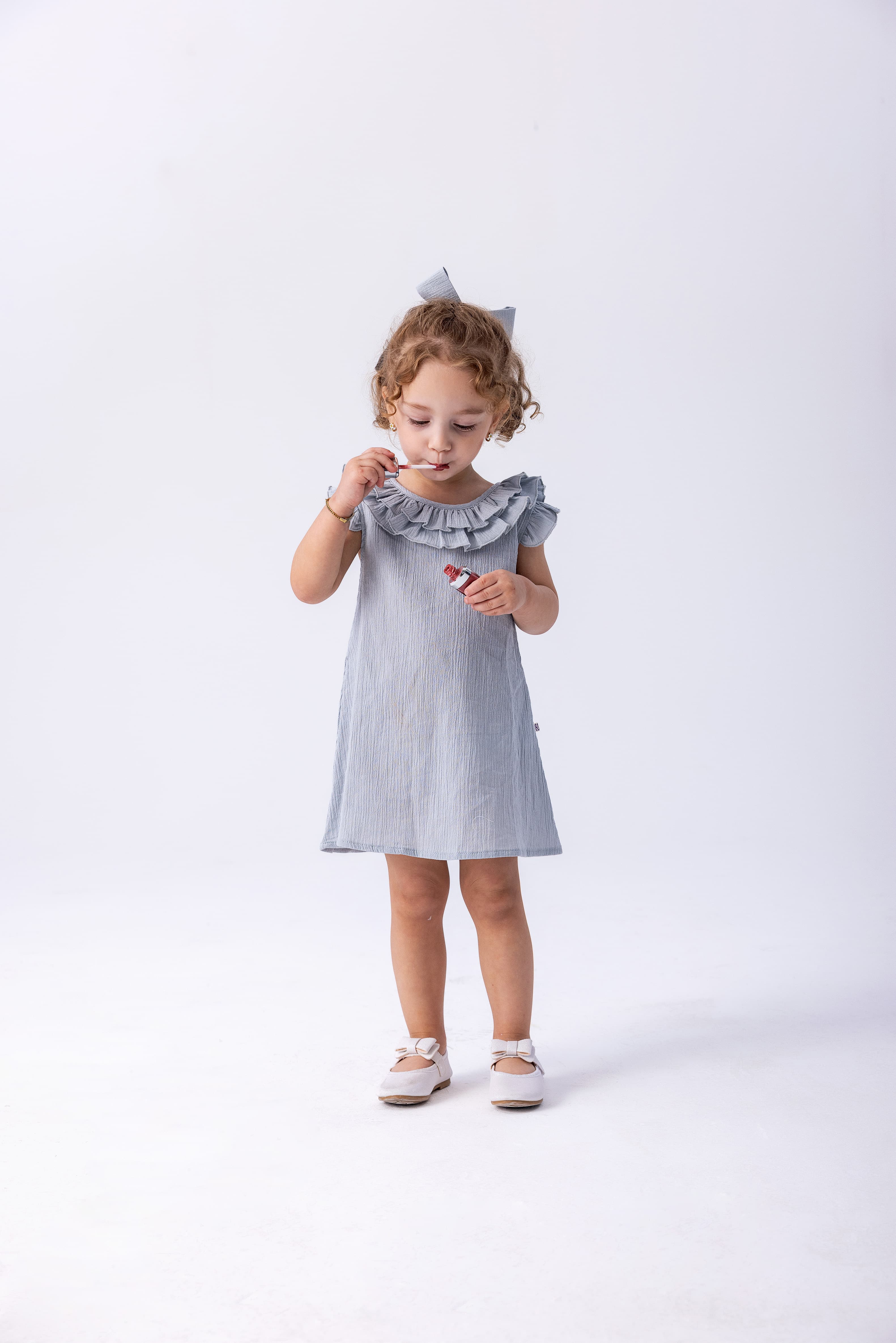 A little one in a handmade Madessa dress